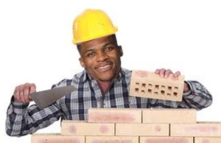 PHOTO Russell Westbrook With A Hard Hat On Laying Bricks To Build A House