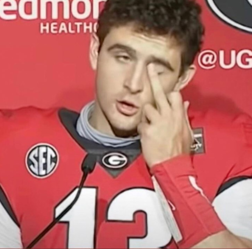 PHOTO Stetson Bennett Flipping Off The Media While Pretending To Rub His Eye