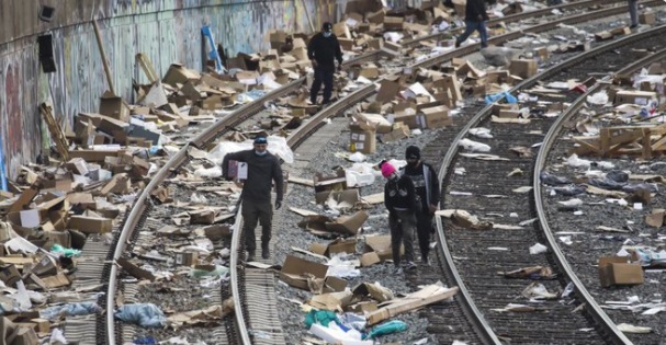 PHOTO Train Tracks Buried By Buglarized Packages In Los Angeles