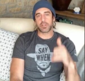 PHOTO Aaron Rodgers Sitting In His Man Cave Wearing A Shirt That Says Say When