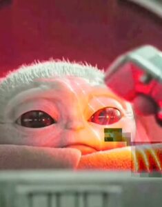 PHOTO Baby Yoda With A Glowing Red Eye