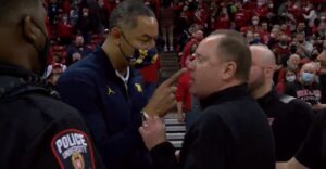 PHOTO Juwan Howard Sticking His Finger In Greg Ward's Face 1 Inch Away While University Police Is Standing Right There