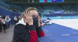 PHOTO Mariah Bell Watching Her Long Time Friend Nathan Chen At The Flower Ceremony After He Won The Olympics