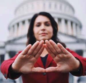 PHOTO Tulsi Gabbard Making An Antifa Hand Sign Outside Capitol Hill