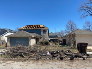 PHOTO Close Up Of Damage On Greenlawn Place In Round Rock TX