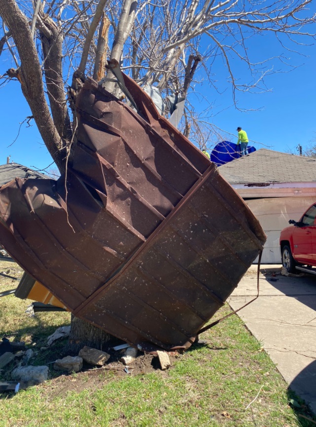 PHOTO Close Up Of Damage On Greenlawn Place In Round Rock TX