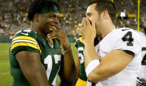 PHOTO Derek Carr Whispering In Davante Adams' Ear On Sideline During Game Are You Coming To The Raiders