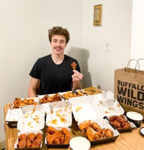 PHOTO Doug Edert Eating 8 Trays Of Wings Two Sides And A French Fry From Buffalo Wild Wings In One Sitting