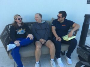 PHOTO John Clayton Sitting On A Couch Wearing Short Shorts Like It's The 1970's