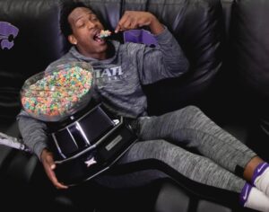 PHOTO One Of Bruce Weber's Players Eating Cereal Straight Out Of The Big 12 Tournament Championship Trophy