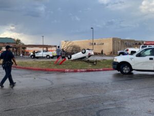 PHOTO Police Responding To Car Flipped Over With Someone Inside Outside Leslie's Pool Supply In Round Rock