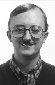 PHOTO Vintage Shot Of John Clayton With A Mustache And Bill Gates Sized Glasses