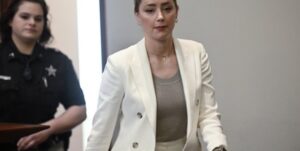 PHOTO Amber Heard Always Looks Like She's Got Something To Hide