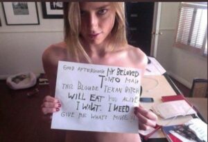 PHOTO Amber Heard Holding A Sign In Her Office Demanding Men TO Give Her What She Needs