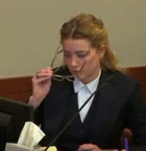 PHOTO Amber Heard Putting On Reading Glasses Like She Actually Cares About Reviewing Documents On The Trial