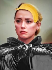 PHOTO Amber Heard Wearing A Trash Bag With A Banana On Her Head Meme