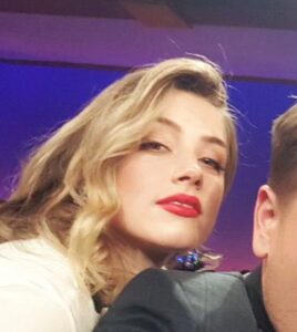 PHOTO Elon Musk Wanted None Of Amber Heard Trying To Seduce Him By Looking Over His Shoulder