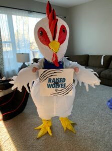 PHOTO Glen Taylor Should Sit Next To Blowup Chicken In Game 2 With A Raise Wolves Rally Sign