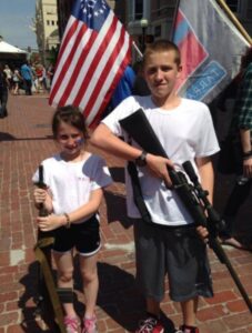 PHOTO Gun Control Is So Out Of Hand In The US That Young Kids Are Just Holding Very Dangerous Automatic Guns