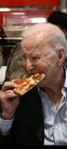 PHOTO Joe Biden Is So Old He Can't Even Bite Off A Piece Of Pizza With His Teeth