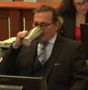 PHOTO Johnny Depp Chugging Coffee Out Of A Mug In Court