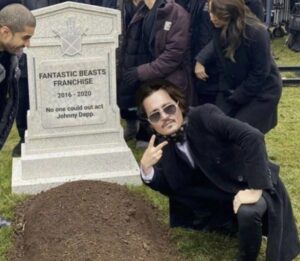 PHOTO Johnny Depp Posing For A Picture In Front Of Fantastic Beasts Franchise RIP Gravestone