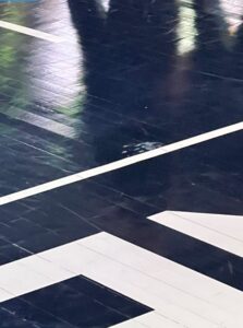 PHOTO Of Woman's Hand Print Made Out Of Glue On Target Center Floor