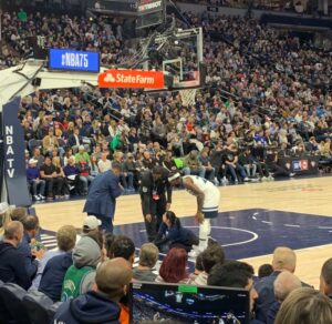 PHOTO Security At Target Center Ripped Woman Who Was Laying Under Timberwolves Basket Off The Floor