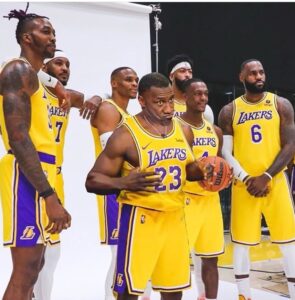 PHOTO Shannon Sharpe Posing For A Picture In A Lakers Jersey With The Team On Media Day