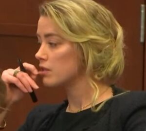 PHOTO Amber Heard Is Disgusting And Picks The Dry Skin Off Her Lips Until They Bleed