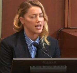 PHOTO Amber Heard Looking Really Ugly In Court When She Disagrees With Something And Doesn't Fix Her Hair