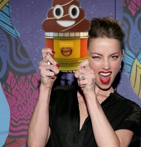 PHOTO Amber Heard Looking Thrilled Holding A Popcorn Can Of Poopie Meme