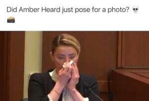 PHOTO Amber Heard Posing For A Picture With Her Tissue In Court For A Full 3 Seconds