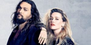 PHOTO Amber Heard Resting Her Arm On Jason Momoa's Shoulder Like They're Tight