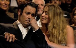 PHOTO Amber Heard Toying With Johnny Depp And He's Just Sitting There Like Please Make This Stop