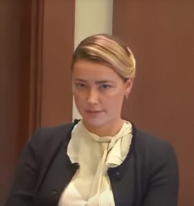 PHOTO Amber Heard's Facial Expression In Between Her Trauma Monologues Will Make You See She Is One Of The Scariest Women In The World