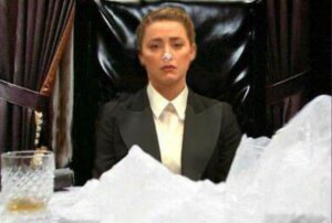 PHOTO Amber Heard's With A Powdered Nose Sitting In Front Of A Pile Of Coke