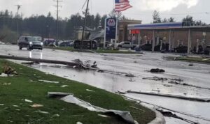 PHOTO Cars Flipped Upside Down Outside Gas Station In Gaylord Michigan Nobody Driving On The Road Because Of Debris