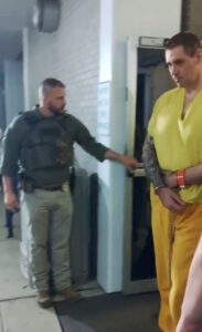 PHOTO Casey White Smirking At All The Camera Crews Watching Him Get Escorted Out Of Courthouse To State Prison In Alabama