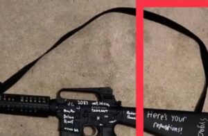 PHOTO Close Up Of Here's Your Reparations Written In Sharpie On Payton Gendron's Gun
