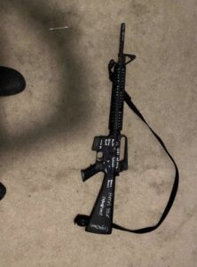 PHOTO Close Up Of Payton Gendron's AR-15 Rifle With Here's Your Reparations Written On It