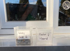 PHOTO Customers At Starbucks in Vaudreuil Quebec Canada Left Coins In Johnny Depp Labeled Container And No Coins In Amber Heard Labeled Container