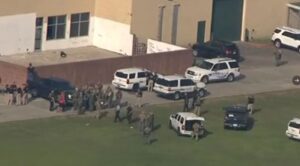 PHOTO Dozens Of Law Enforcement Behind Robb Elementary School After Shooting