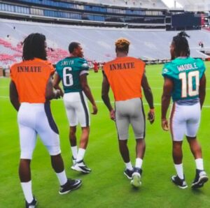 PHOTO Jerry Jeudy And His Buddy From Jail Wearing Orange Inmate Uniforms During Broncos Practice Friday Meme