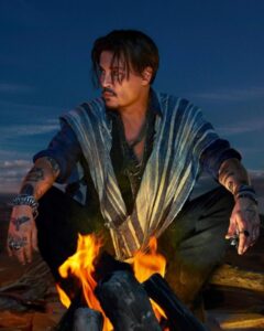 PHOTO Johnny Depp Meditating By The Fire By Himself Now That He's Divorced From Amber Heard