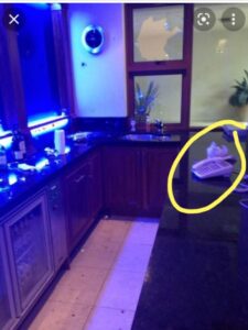 PHOTO Of Crime Scene With Phone Intact And Broken Bottles Where Johnny Depp Said Amber Heard Threw Bottles At Him And Amber Said Johnny Cut His Finger On The Phone