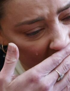 PHOTO Only One Real Tear Seen Dripping From Amber Heard's Face On Thursday Could Be A Drop Of Water Or Spit