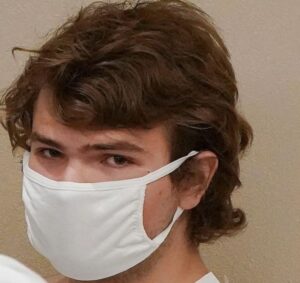 PHOTO Payton Gendron Looking With Evil In His Eyes While Wearing A Face Mask