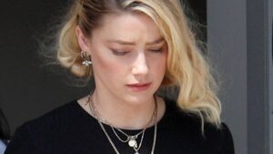 PHOTO Amber Heard Looked Distraught And Very Hurt Inside Leaving Court After Losing Trial To Johnny Depp