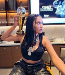 PHOTO Ayesha Curry Flexing With The Larry O'Brien Trophy Resting On Her Shoulder
